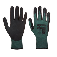 Green and black dexti cut pro glove. Glove has green wrist and black palm.