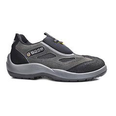 Black And Grey Base Quark Slip On Safety Shoe with a protective toe, Scuff cap and Grey contrast on the side of the sole and side of the mid area.
