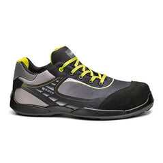 Base Bowling/Tennis Safety Trainer. Trainer has a black sole, Black scuff cap, Grey, Black and yellow mid andYellow laces. Boot has base branding through out.