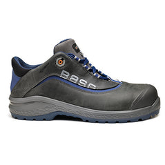 Black Base Be Joy Safety Shoe. Shoe has a blue sole, Grey sole upper, black scuff cap and black and blue laces. Shoe has base branding and Blue contrast through out.