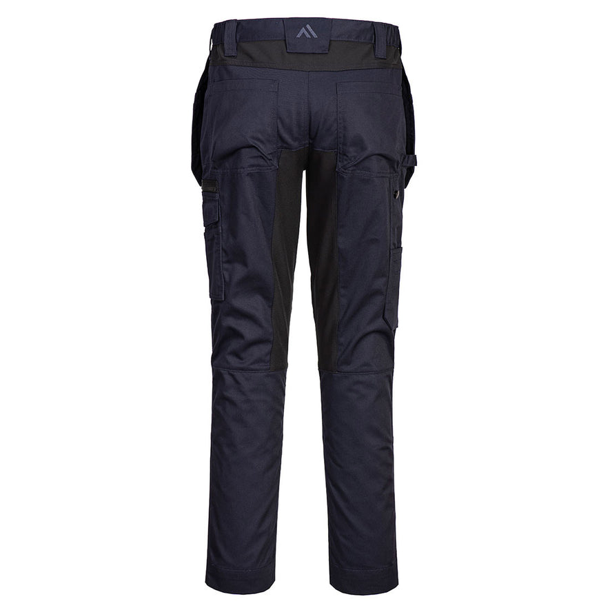 Back of Portwest WX2 Eco Stretch Holster Trousers in dark navy with belt loops on waist band, Flap holster pockets on waist band, pockets on top and sides and black panels on insides of legs, below waist band and side of knees.