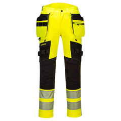 Yellow DX4 detachable hi vis holster trousers with visible tool loops and detachable holster pockets. Trousers have black trim on the zips top of pockets and kneepad area as well as two hi vis bands on the ankles.