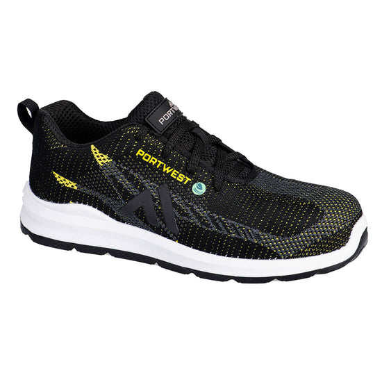 Portwest Eco Fly Composite Trainer in black with white sides of sole, mesh upper with yellow panels, stitching and branding on side, laces and rubber portwest rectangle on tongue.