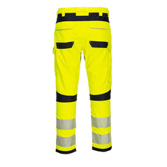 Back of Portwest PW3 Flame Resistant Hi-Vis Work Trousers in fluorescent yellow and two reflective strips on legs below black knee patches. Pocket on side of leg and two on bottom. Belt loops on waistband with black panel.