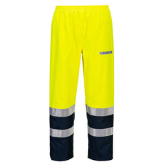 Portwest Bizflame Multi Light Arc Hi-Vis Trousers in yellow with navy ankles and reflective strips on ankles. Reflective sticker on side of leg and elasticated waist band.