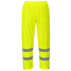 Yellow hi vis rain trousers with hi vis ankle bands on the ankles.