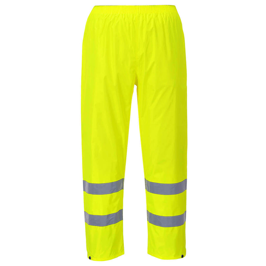 Yellow hi vis rain trousers with hi vis ankle bands on the ankles.