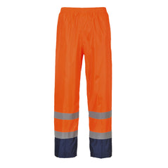 Orange Hi-Vis classic contrast rain Trouser with reflective strips on the ankles and navy contrast on the bottom of the legs.