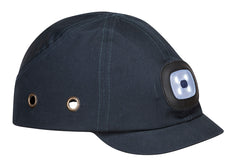 Portwest USB Rechargable LED Bump Cap in navy with peak, two ventilation holes on side, stitching over top and black and white LED light on front.