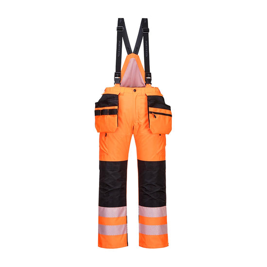 Orange PW3 Hi-Vis Winter trouser. Trousers have holster pockets on the legs and reflective stripes on ankles. Trousers have black contrast on the knee pad pocket area, Holster pockets and on the brace straps. Trousers have high back on the trouser to protect from rear splashing.