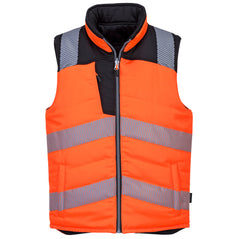 Portwest PW3 Orange reversible bodywarmer. Body-warmer is hi vis and has zip pockets on the front. Bodywarmer has hi vis bands across the chest and shoulders. Black contrast on the shoulders and upper chest of the bodywarmer.