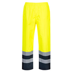 Yellow Hi-Vis classic contrast rain Trouser with reflective strips on the ankles and navy contrast on the bottom of the legs.