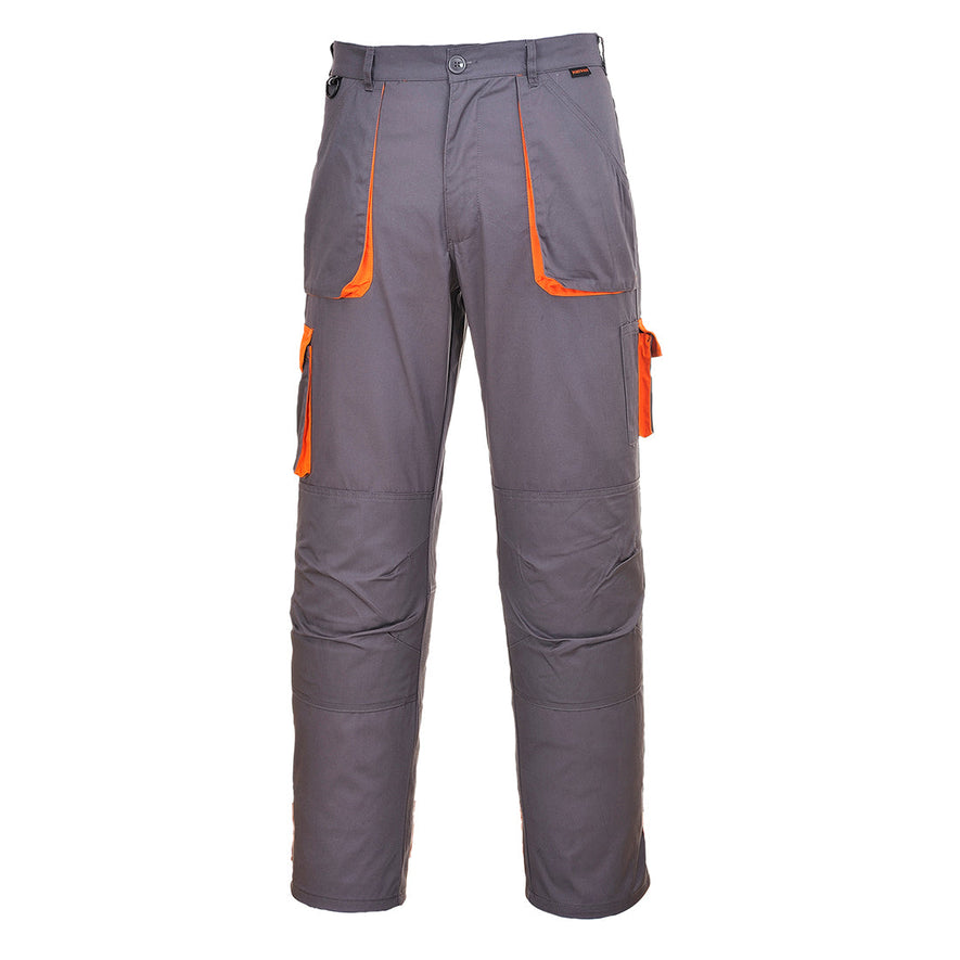 Grey Portwest Texo Contrast trouser. Trouser has pockets on the sides and cargo style trousers on the lower knee. Trousers have orange contrast on the sides of the pockets and cargo pocket flaps.