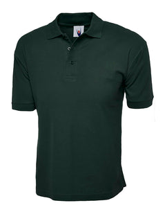 Uneek Clothing UC112 220GSM Cotton Rich Poloshirt in bottle green with short sleeves, collar and three button plackett.