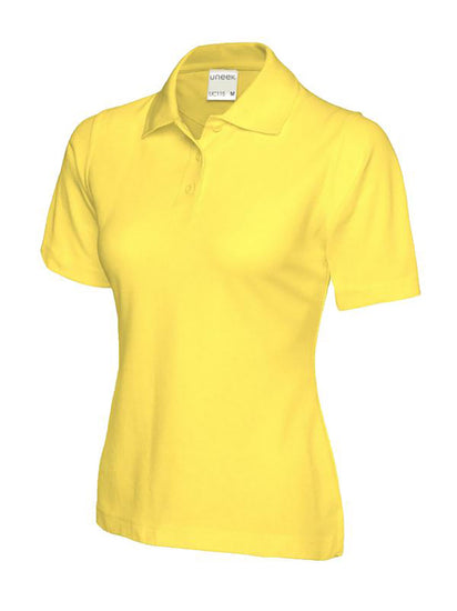 Uneek Clothing UC115 180GSM Ladies Polo Shirt with short sleeves, collar and three button plackett in yellow.