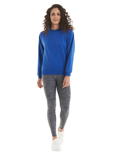 Person wearing Uneek Clothing UC205 Olympic Sweatshirt long sleeves and round neck in royal blue with elasticated bottom.