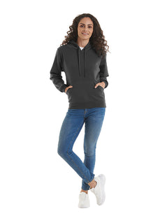 Person wearing Uneek Clothing UC510 - Ladies Deluxe Hooded Sweatshirt long sleeve in black with hood, drawstring, large pocket on front and elasticated bottom and wrists. 