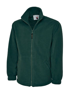 Uneek Clothing UC601 380GSM Premium Full Zip Micro Fleece Jacket in bottle green with full zip fastening and and two zipped lower front pockets.