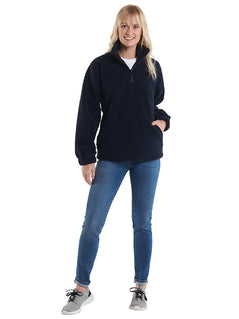 Person wearing Uneek Clothing UC602 380GSM Premium 1/4 Zip Micro Fleece Jacket in black with part zip fastening and and two zipped lower front pockets.
