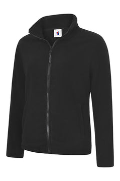 Uneek Clothing UC608 Ladies Classic Full Zip Fleece Jacket in black with full zip fastening and and two lower front pockets.