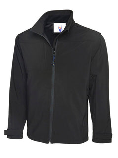 Uneek Clothing UC611 Premium Full Zip Soft Shell Jacket in black with full zip fastening and and a pocket on the right chest and two lower front pockets.