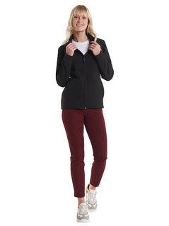 Person wearing Uneek Clothing UC613 Ladies Classic Soft Shell Jacket in black with full zip fastening and two lower front pockets.