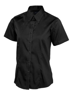 Uneek Clothing UC704 Ladies Pinpoint Oxford Half Sleeve Shirt in black with black buttons and collar with black buttons.