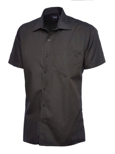 Uneek Clothing UC710 Mens Poplin Half Short Sleeve Shirt in black with collar, pocket on left chest and black buttons down front.