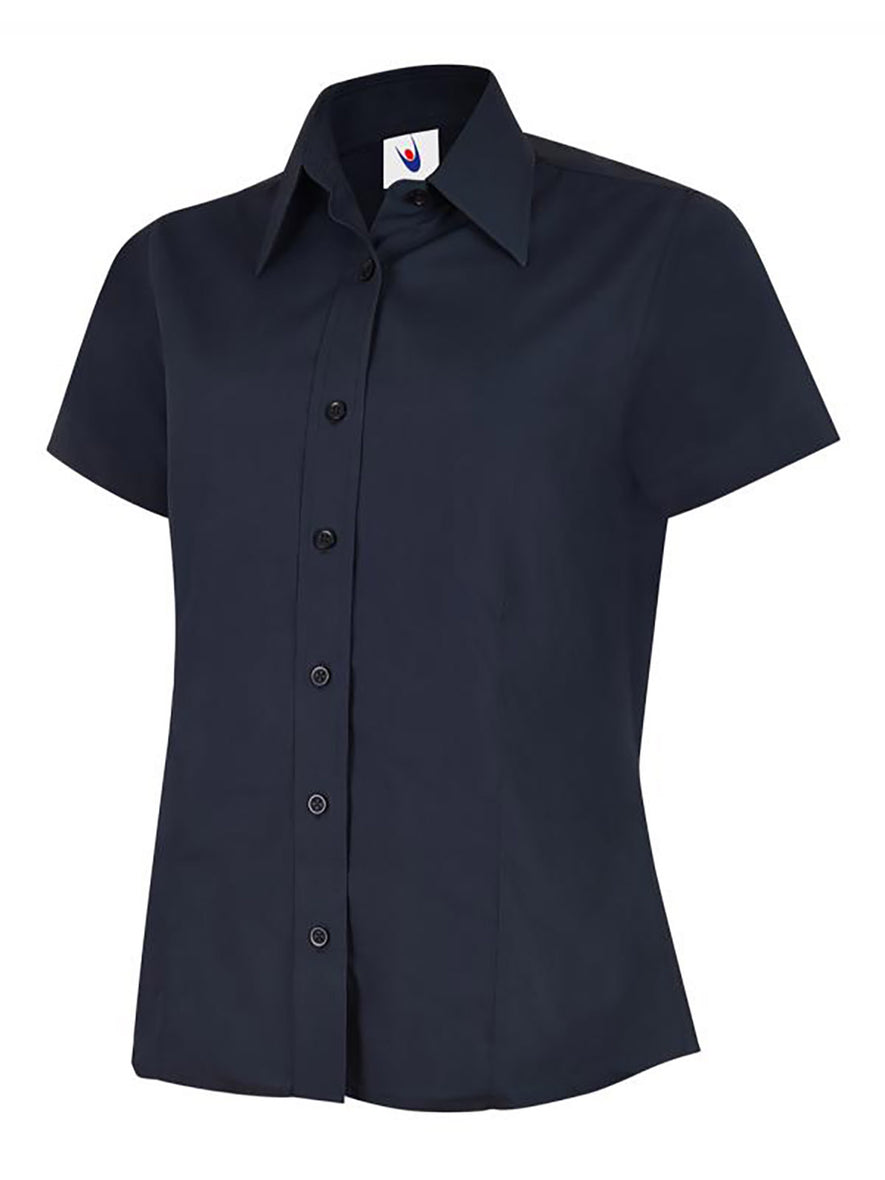 Uneek Clothing UC712 - Ladies Poplin Short Sleeve Shirt in navy with tailoring on front, collar and navy buttons down front.
