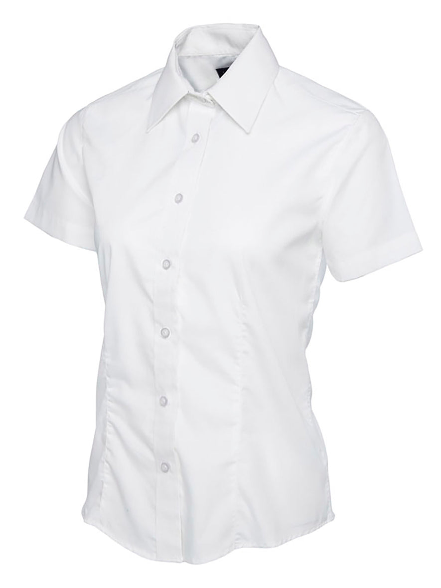 Uneek Clothing UC712 - Ladies Poplin Short Sleeve Shirt in white with tailoring on front, collar and white buttons down front.