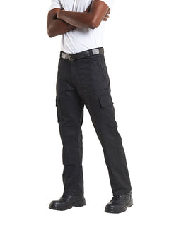 Person wearing Uneek Clothing UC903 Action Trouser in black with belt loops, button and zip fastening at waist, two side pockets with zips and two pockets on side of legs with flaps. Knee pad patches on both knees.