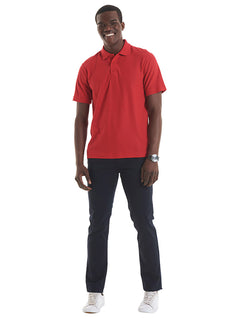 Person wearing Uneek Clothing UX1 The UX Polo in red with short sleeves, collar and three button plackett.