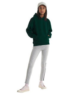 Person wearing Uneek Clothing UX8 The UX Children's Sweatshirt in bottle green with long sleeves, hood, large front lower pocket and elasticated wrists and bottom.