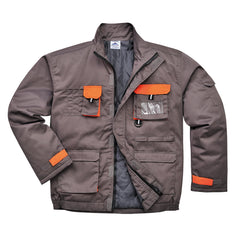 Grey portwest Texo lined Contrast Jacket. Jacket has pockets on the front waist, Chest and midrift of the jacket. One phone pocket and one pen pocket with an ID badge holder on the left. Orange contrast on the flaps and sides of the pockets.