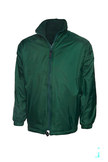 Uneek Clothing UC605 Premium Reversible Fleece Jacket in bottle green with full zip fastening and and two lower front pockets.