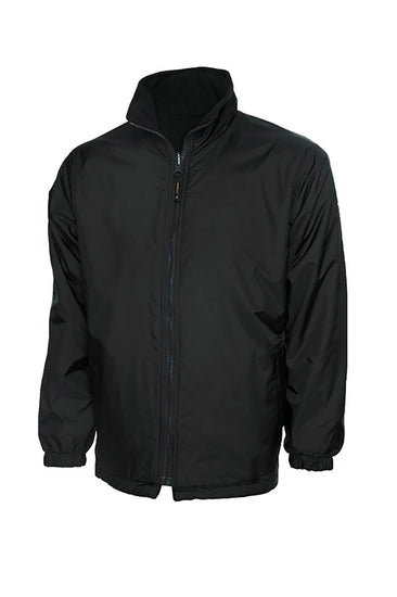 Uneek Clothing UC606 Childrens Reversible Fleece Jacket with waterproof outside in black with full zip fastening and two lower pockets.